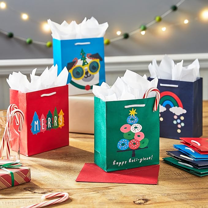 Hallmark 6" Small Christmas Gift Bags for Kids (8 Bags: Rainbow Candy, Donut Tree, Merry, Cute Pug Puppy) for Gift Cards, Holiday Party Favors, Teacher Presents